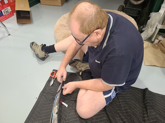 1 - Danny Lee fitting body rubber to freshly chroomed rear bumper