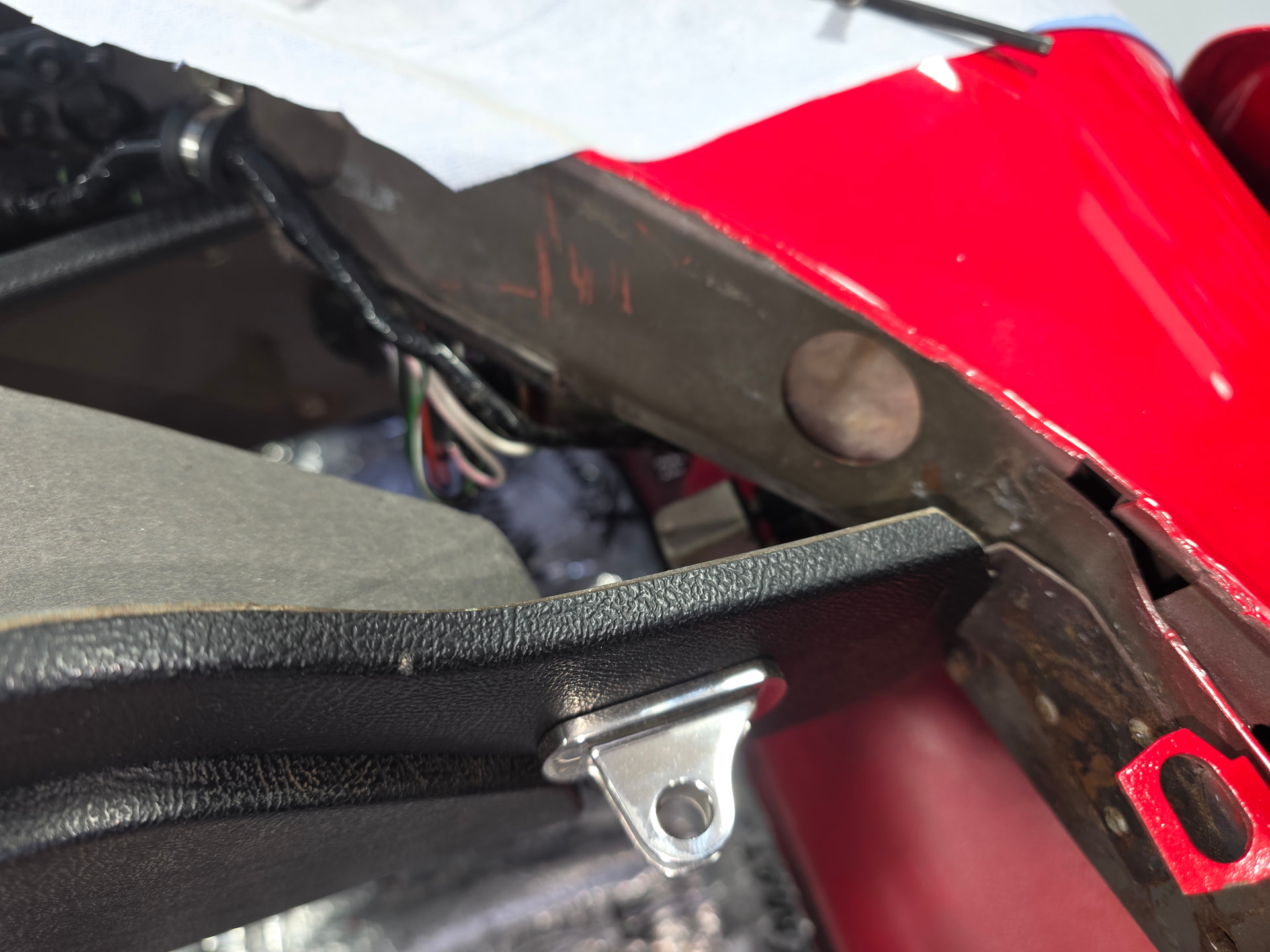 Factory Insulation - Stuff 'stuffed' in the cavity L/R of Rear Wheel ...