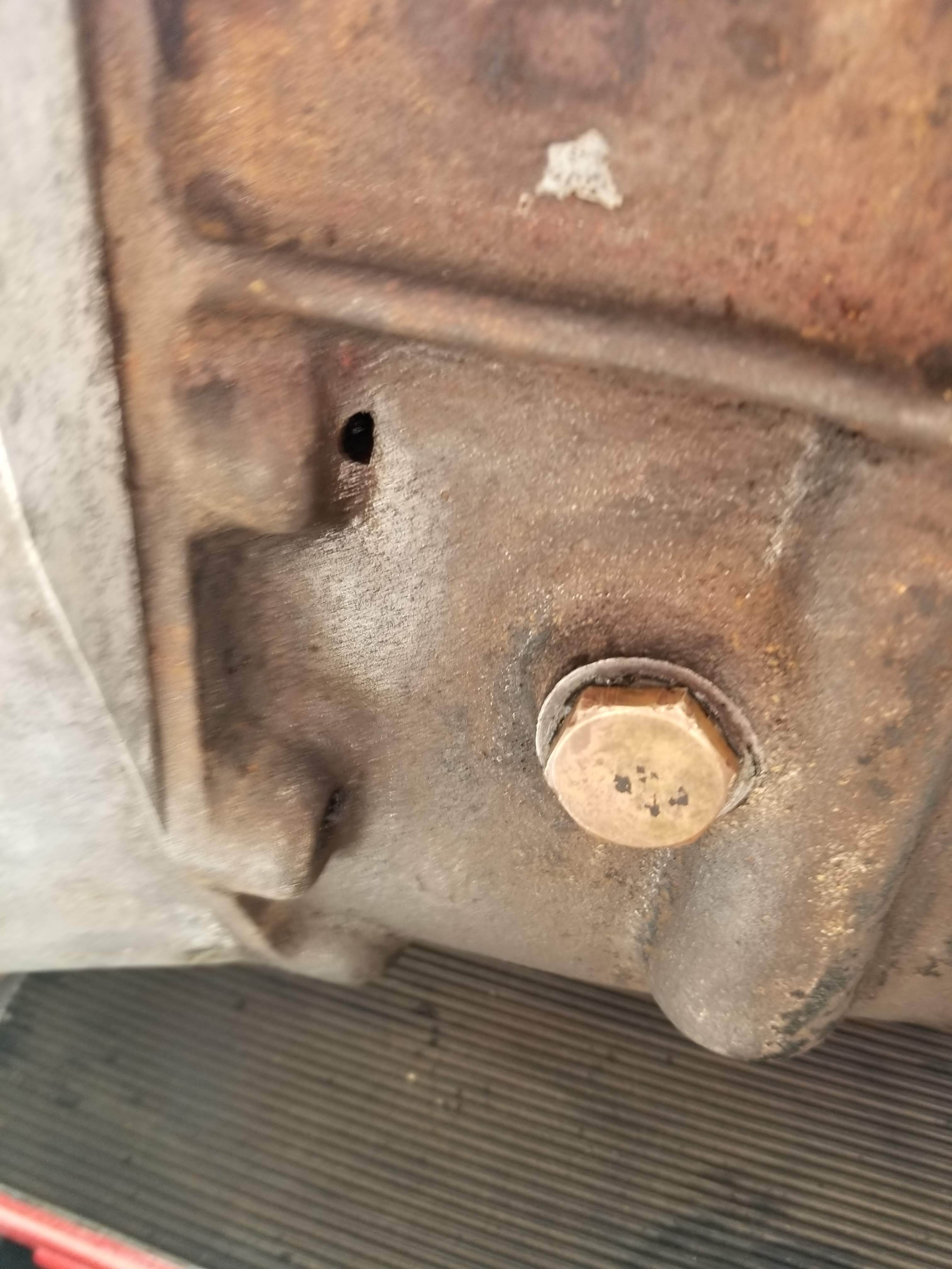 Hole in gearbox case that is not supposed to be there EType Jag